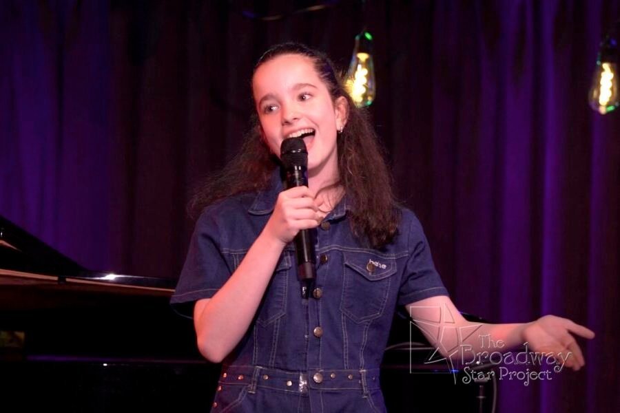 Young performer appearing in a live New York City cabaret show